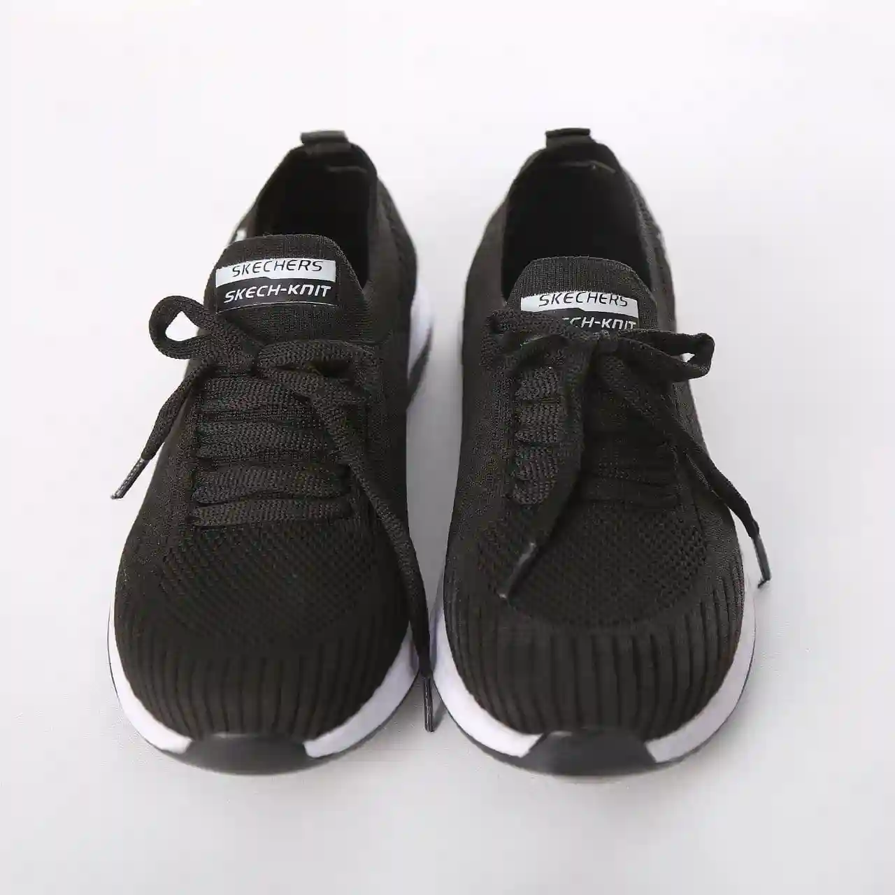 کفش روزمره اسکیچرز skechers مشکی سفید کد 128